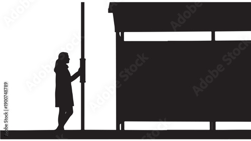 Woman reading poster on urban billboard in dark silhouette with high contrast lighting for advertising