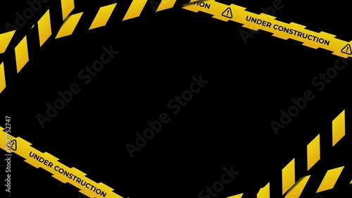 Under construction tape animation with yellow and black diagonal stripes. Warning danger tape. Warning frame animation with yellow and black diagonal stripes. Transparent background with alpha channel