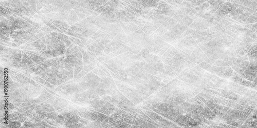 An abstract black and white grunge background texture featuring a rough gray cement wall pattern with old paint and dirty marble stone surfaces for a textured winter ice backdrop design