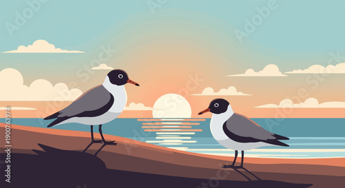 Two seagulls stand on a beach at sunset over the calm sea