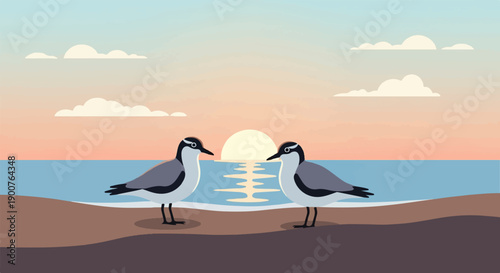 Two shorebirds on a beach at sunrise with reflections on the water