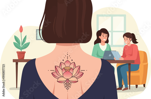 Woman with lotus tattoo working with colleagues in an office