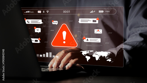 Fotografía Cybersecurity breach alerts display a red warning symbol and an image of a business person typing on a laptop, indicating an email scam