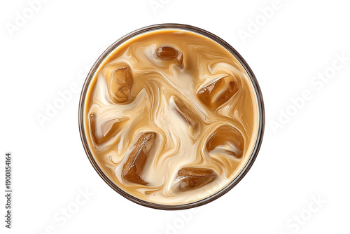 Overhead shot of an iced coffee with milky swirls and ice cubes in a glass against black