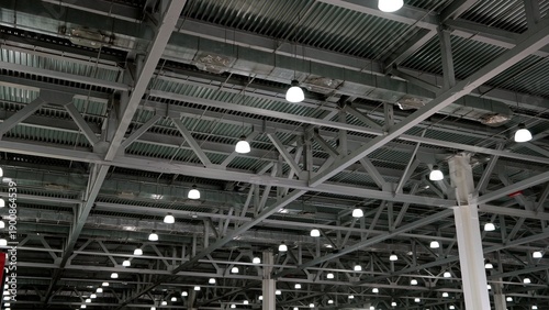 Industrial warehouse ceiling showing metal beams structure