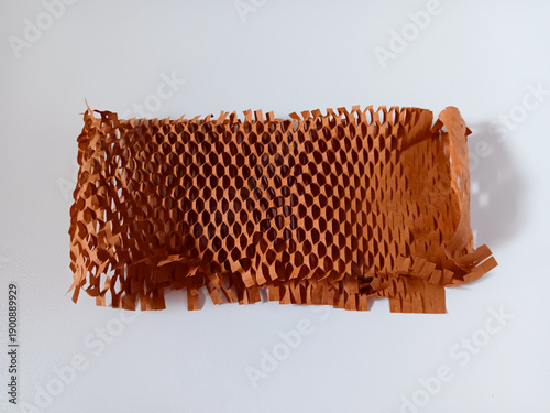 Cuadro en lienzo Close up of a piece of brown honeycomb packing paper isolated on white background