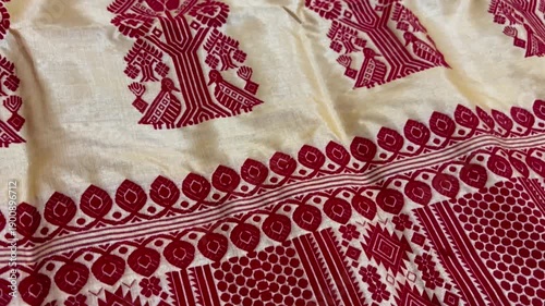 Tilt up shot of Traditional Assamese Toss Muga Chador of Assam, Muga silk chador of Assam