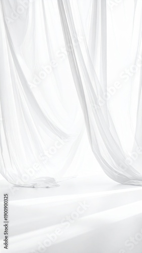 Ethereal White Fabric Draped Gracefully with Subtle Shadows and Soft Lighting