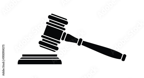 A stark black silhouette depicts a gavel resting upon a sound block symbolizing justice and legal proceedings
