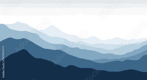 A serene landscape of layered blue mountains fading into a bright white sky.