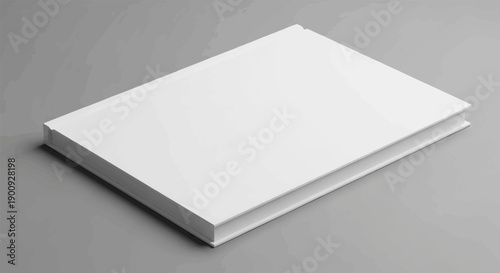 A plain white book lies on a plain grey surface, presented at an angle