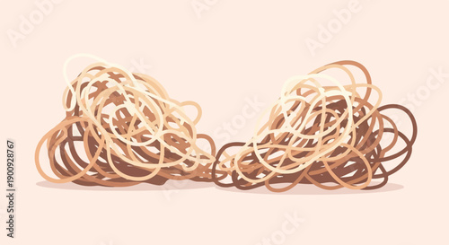 A messy pile of tangled, light brown pasta strands on a pale background