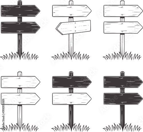 Six black and wooden direction signs with grass in monochrome