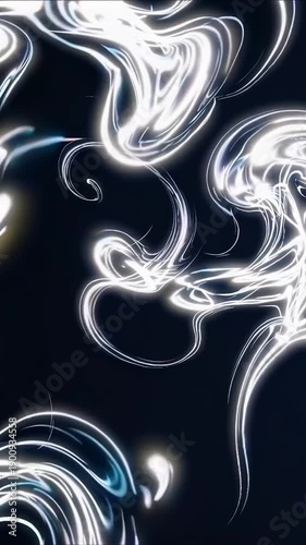 Explore bright patterns of light and movement in dynamic abstract shapes with changing designs and flowing lines in a dark space