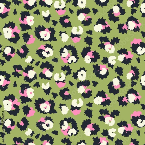 Seamless animal print vector pattern with abstract leopard spots in black, cream, and pink on an olive green background. Stylish modern texture for fashion, fabric, wallpaper, and accessories