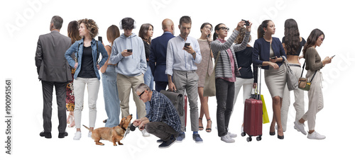 Group of people standing close together. Men and women of different ages wearing casual and business clothing.