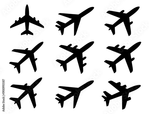 Black airplane silhouette set in different flying positions, commercial passenger jet aircraft