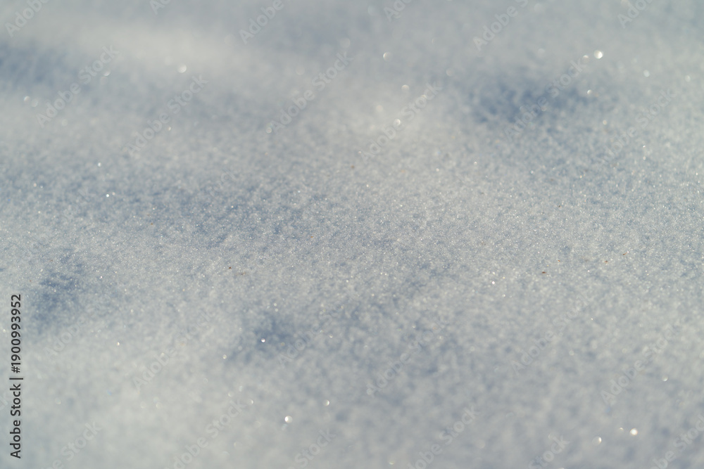 Obraz premium Frosty snow tones, Ambient icy landscape featuring soft shades and undulating textures, Cool color palette showcasing delicate snow contours against subdued blue shadows