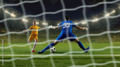 Photos Striker facing goalkeeper during penalty shot