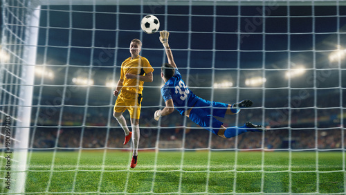 Photography Goalkeeper diving to save shot during match