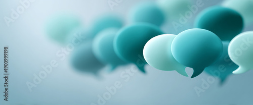 Abstract composition of floating speech bubbles in various shades of teal and blue with soft focus background representing communication and dialogue