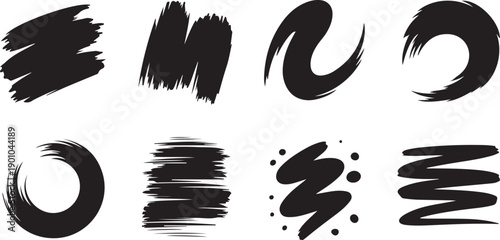 Various black paint brush strokes and swirl shapes are isolated on a crisp white background