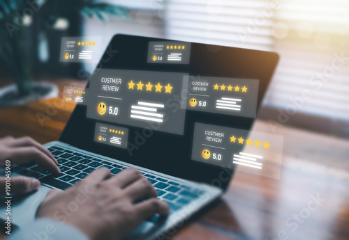 Photos Customer review and five star rating displayed on laptop screen