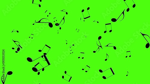  Musical notation notes moving around on a green screen.
