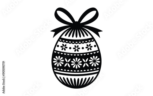 Decorative easter egg with bow and floral patterns on white background for holiday and celebration designs