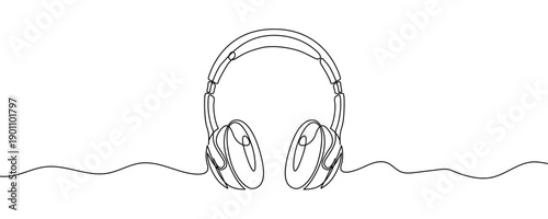 Headphones in line art style. Minimalist drawing of an audio accessory made in a continuous line. Vector illustration.