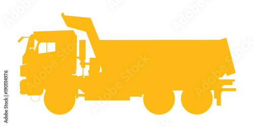 Yellow dumper truck transporting sand and gravel on a construction