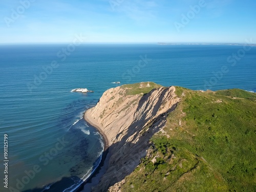 Schilderij op canvas Aerial view of rocky coastal headland and turquoise Pacific Ocean, Northern Cali