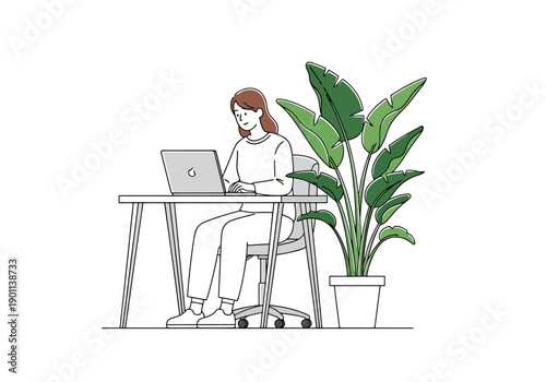 Young woman working on laptop computer at a desk in a modern home office space next to a large potted plant illustrating remote work and study