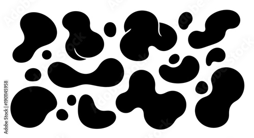 A collection of abstract black blobs and shapes scattered across a white background.