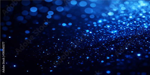 Shiny blue abstract background with fiber optic light spots and bright bokeh particles creating a glowing winter star pattern for a holiday motion loop