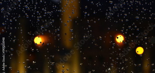 Obraz na plátně Backlit drops on a glass screen wit circle lights as background