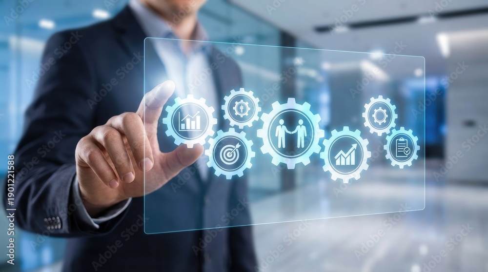 Obraz premium Businessman touching holographic gears with icons for business metrics and collaboration