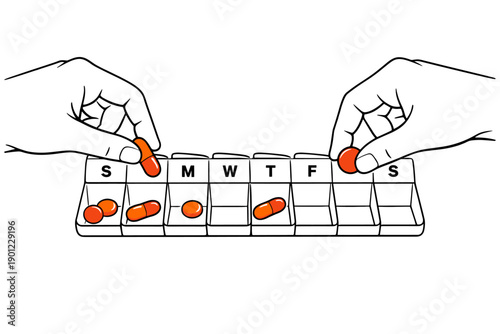 Hands organizing pills in weekly medicine organizer