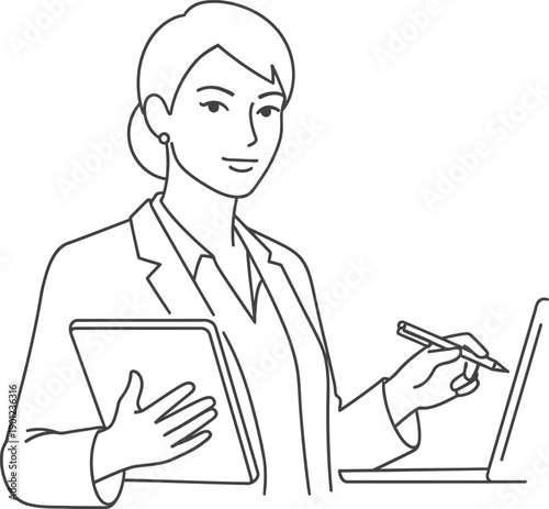 A woman in a blazer working on a laptop and holding a tablet