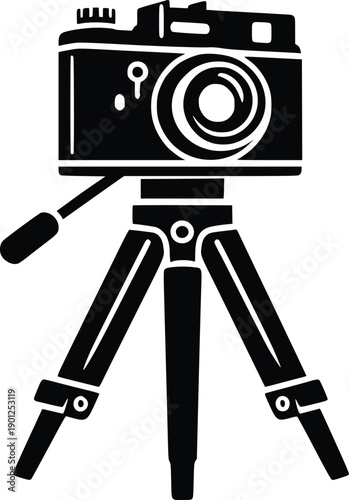 Vintage camera mounted on a sturdy tripod for stability and precision