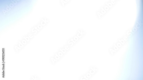 Smooth cinematic cold white light transitions with lens flare and bokeh effect