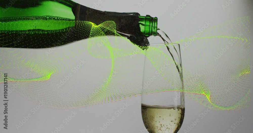 Fototapeta premium Pouring green bottle sending sparkling liquid into stemmed glass in studio, neon-green dot wave