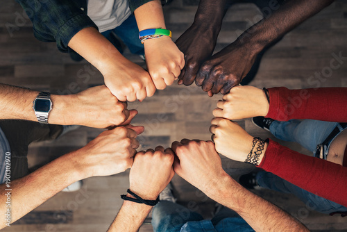 Valokuva Diverse Hands Forming a Circle Symbolizing Teamwork, Inclusion, and Unity
