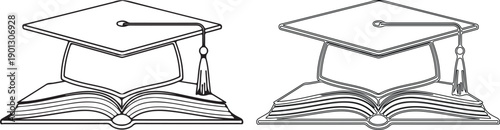 Graduation cap on open book with tassel