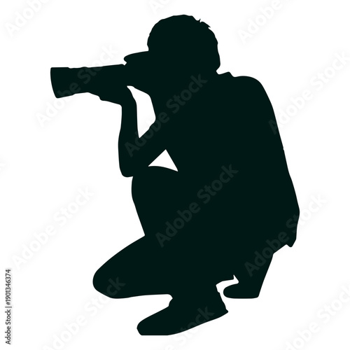 Cuadro en lienzo Photographer kneeling silhouette