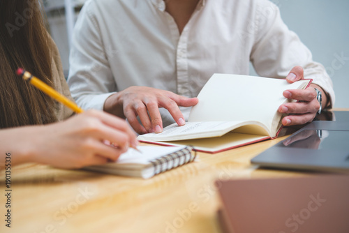 Quadro em tela Young students campus helps friend catching up and learning.