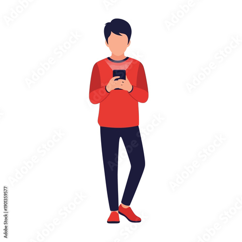 Young man standing and using smartphone in casual attire