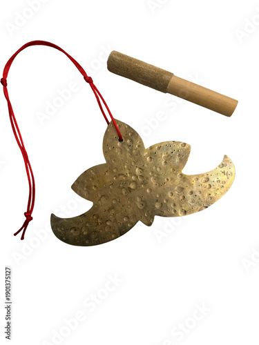 Handcrafted meditation and yoga musical instruments on ethnic textile background