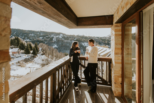 Couple enjoys warm drinks o...