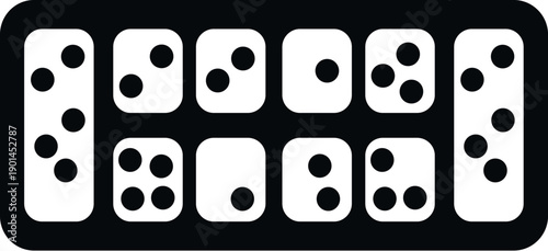 Dice showing different numbers in a playing tray or box for games